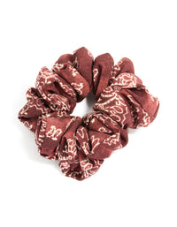 Discover a statement fabric scrunchie featuring paisley design in maroon and beige tones front view - link has visual effect only