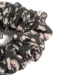 Beautifully crafted scattered floral printed statement scrunchie in black, light pink, beige side view - link has visual effect only