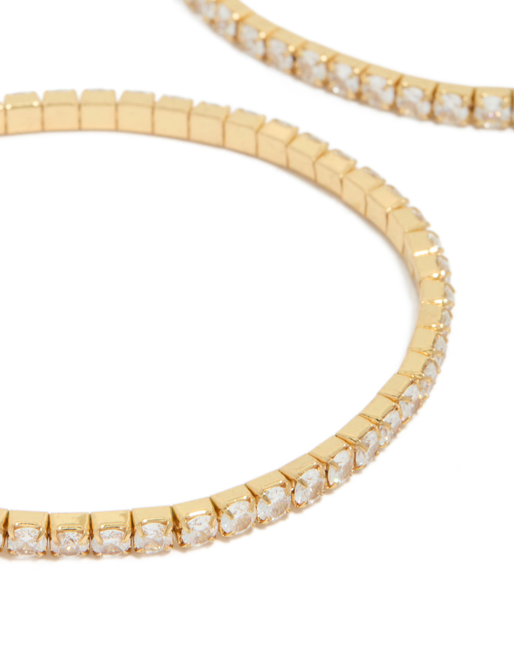 Designed with gold plated cubic zirconia, stretch tennis bracelets in a dainty 2-pack close up view