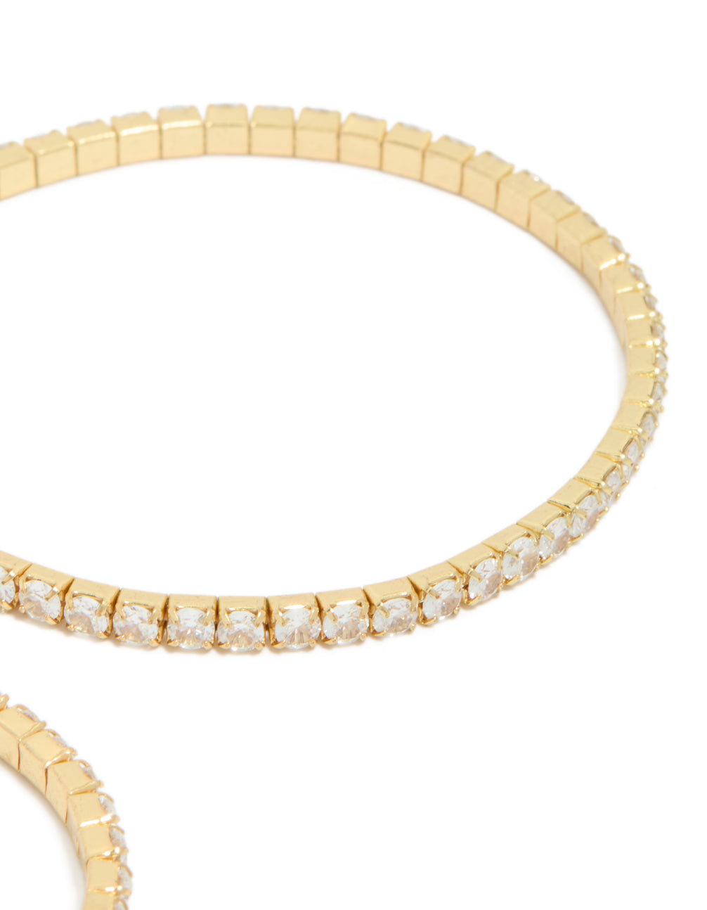 Highlighting gold plated cubic zirconia stretch tennis bracelets in a dainty 2-pack closure detail view