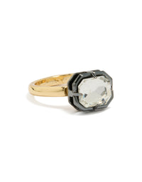 Showcasing a gold plated cubic zirconia mixed metal statement ring featuring crystal details in silver front view - link has visual effect only