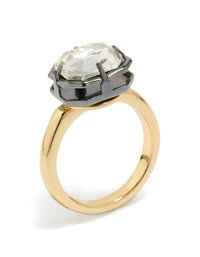 Displaying a gold plated cubic zirconia mixed metal statement ring featuring crystal detailing in silver with chunky construction side detail view - link has visual effect only