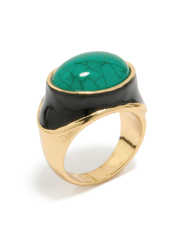 Showcasing a statement chunky ring in gold plated enamel with mediumturquoise stone side detail view