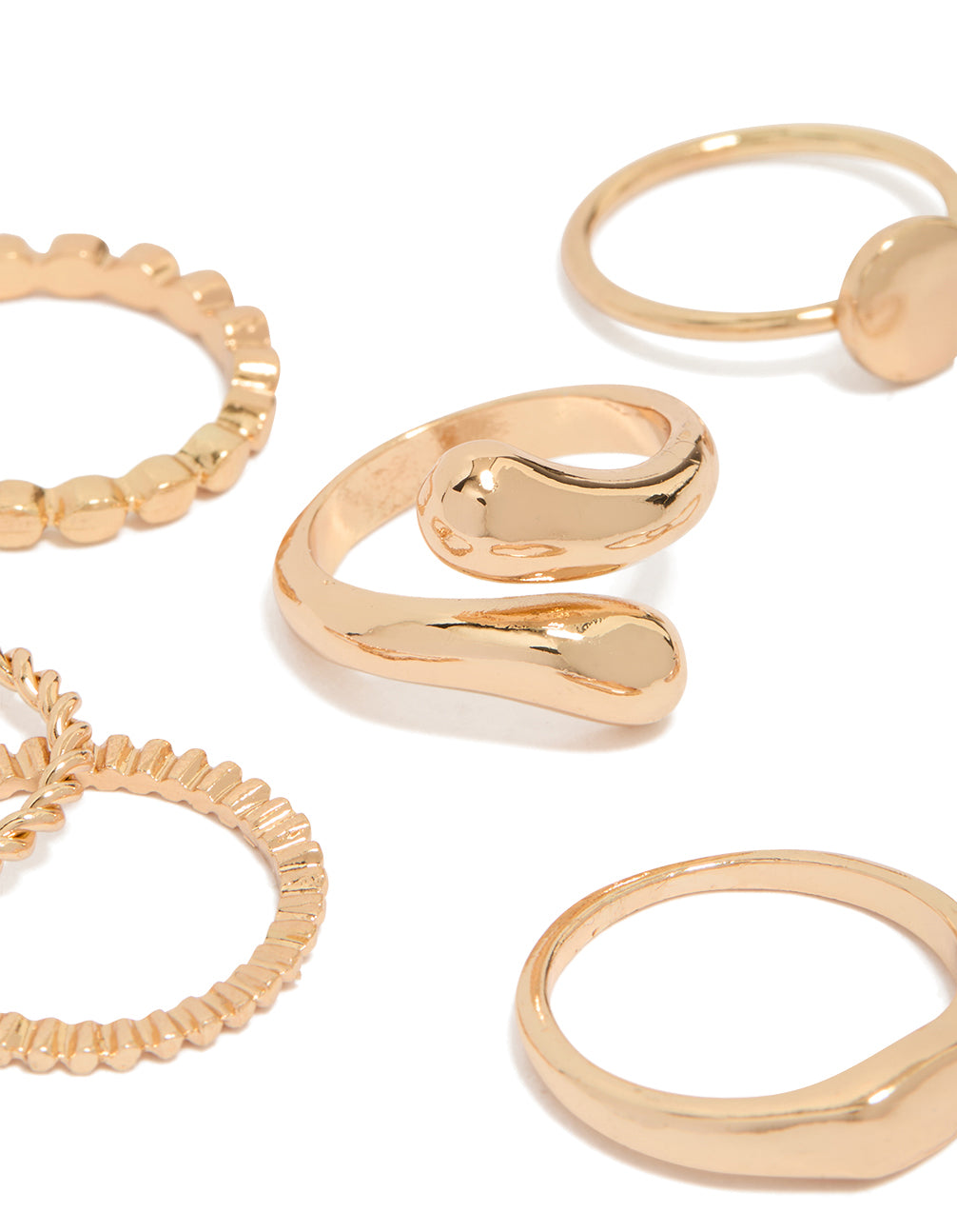 Showcasing thin wrap circle and rectangle signet rings 8-pack in gold with dainty style close up view