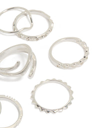 Highlighting mixed swirl stacking rings 8-pack with charm disc elements in silver side detail view - link has visual effect only