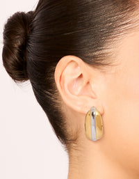 Discover waterproof mixed plated stainless steel hoop earrings in silver and gold on ear view - link has visual effect only