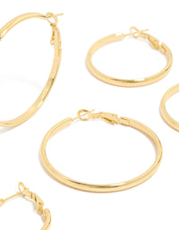 Crafted from waterproof gold plated stainless steel with wide round hoop closure in a 3-pack close up view - link has visual effect only