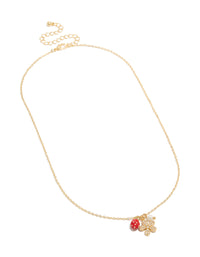 Beautifully crafted gold plated strawberry and flower charm necklace featuring fruit inspired charms with cubic zirconia and pearl accents, front view - link has visual effect only