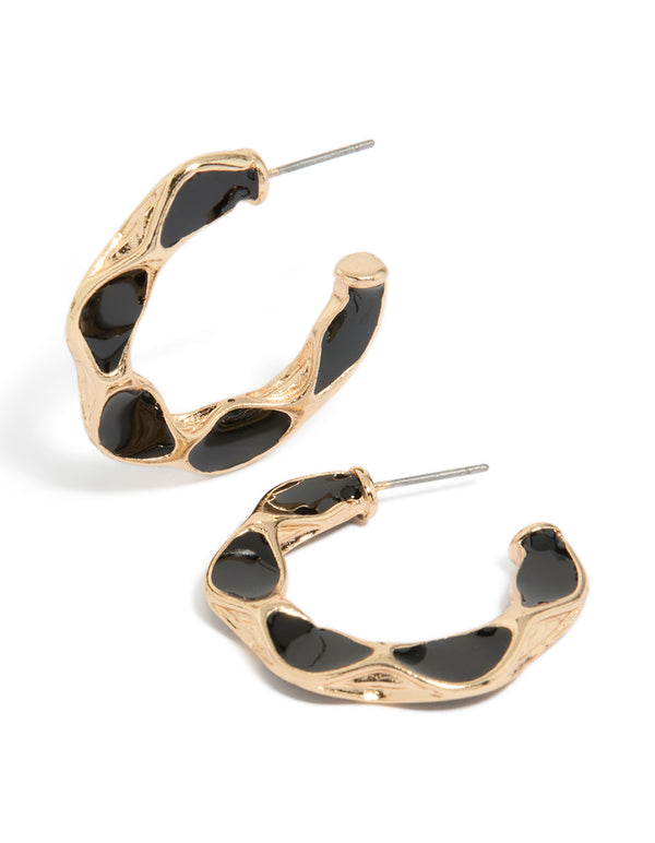 Showcasing textured hoop earrings with enamel in gold and black front view