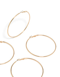 Showcasing gold large hoop earrings 2-pack with statement styling and clasp detail view - link has visual effect only
