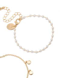 Highlighting gold discs and pearl 2-pack bracelets closure detail view - link has visual effect only