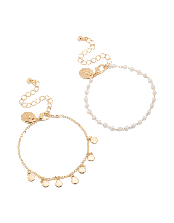 Showcasing gold discs and pearl 2-pack bracelets front view