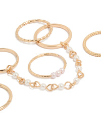 Featuring gold pearl chain and thin rings 6-pack with beaded charm details close up view - link has visual effect only