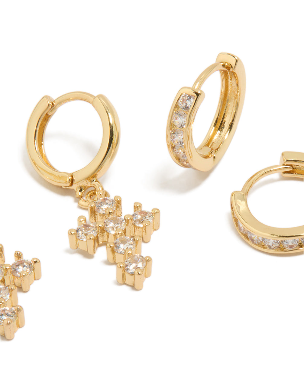 Exquisite gold plated brass huggie earrings with cubic zirconia and cross in a 2-pack close up view