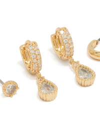 Crafted from gold plated cubic zirconia featuring pear cut stones with huggie and stud closures in a 3-pack close up view - link has visual effect only