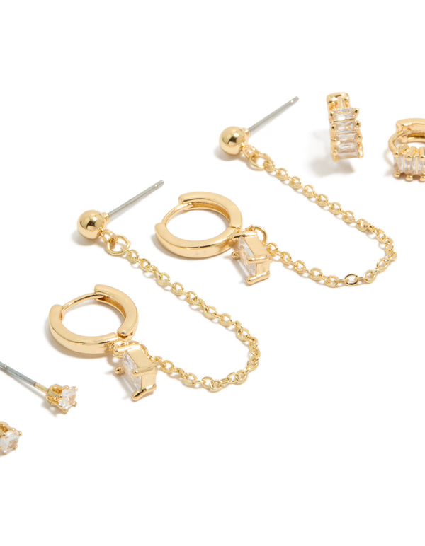 Showcasing gold plated baguette chain and huggie earrings 4-pack featuring crystal cubic zirconia stud closure close up view