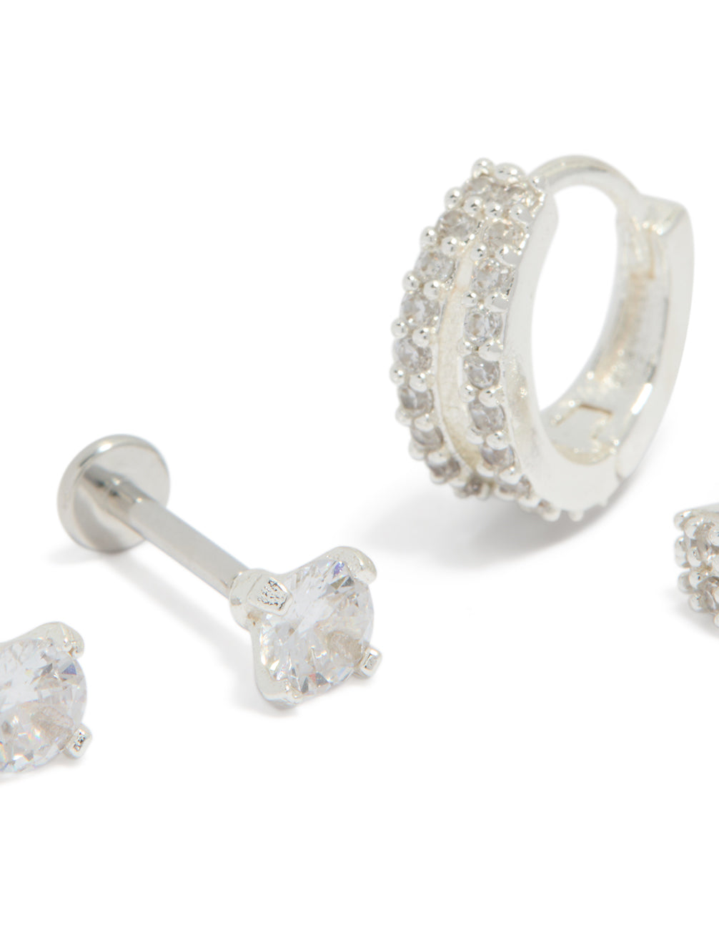 Featuring silver plated brass flat back studs and huggie earrings pack close up view