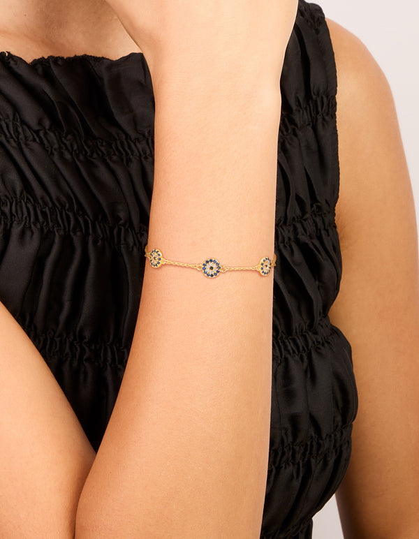 Elegant gold plated evil eye station bracelet on wrist view
