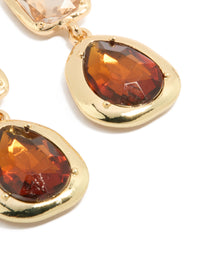 Featuring statement gold brown diamantes drop earrings with faceted stone settings close up view - link has visual effect only