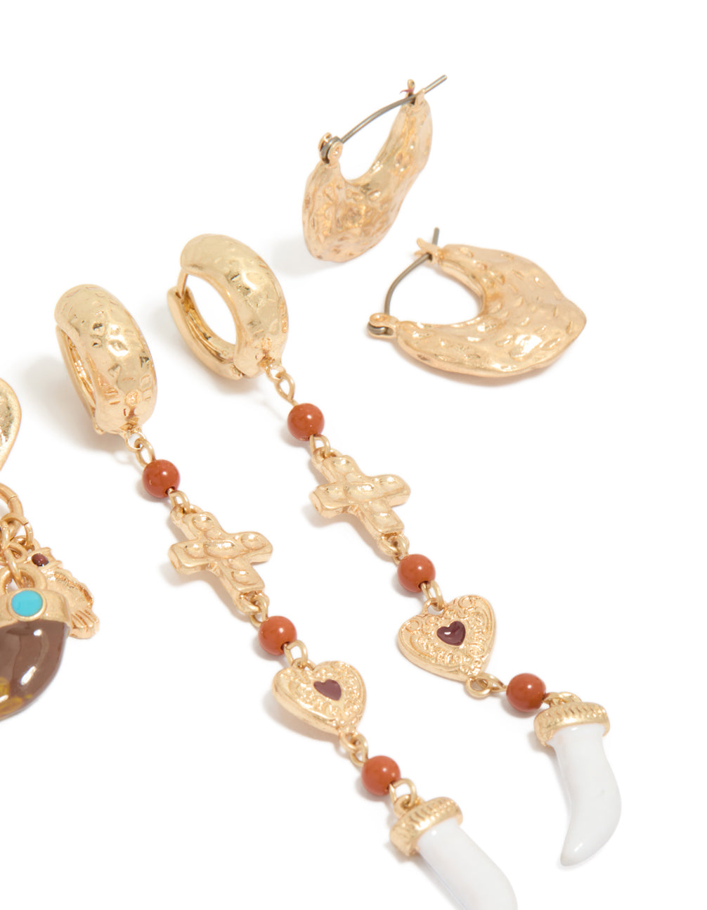 Designed with worn gold statement earrings 3-pack featuring beads, charm, cross, heart, and stud, huggie closure post detail view