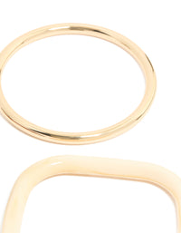 Crafted from resin, thin bangle in gold tones close up view - link has visual effect only