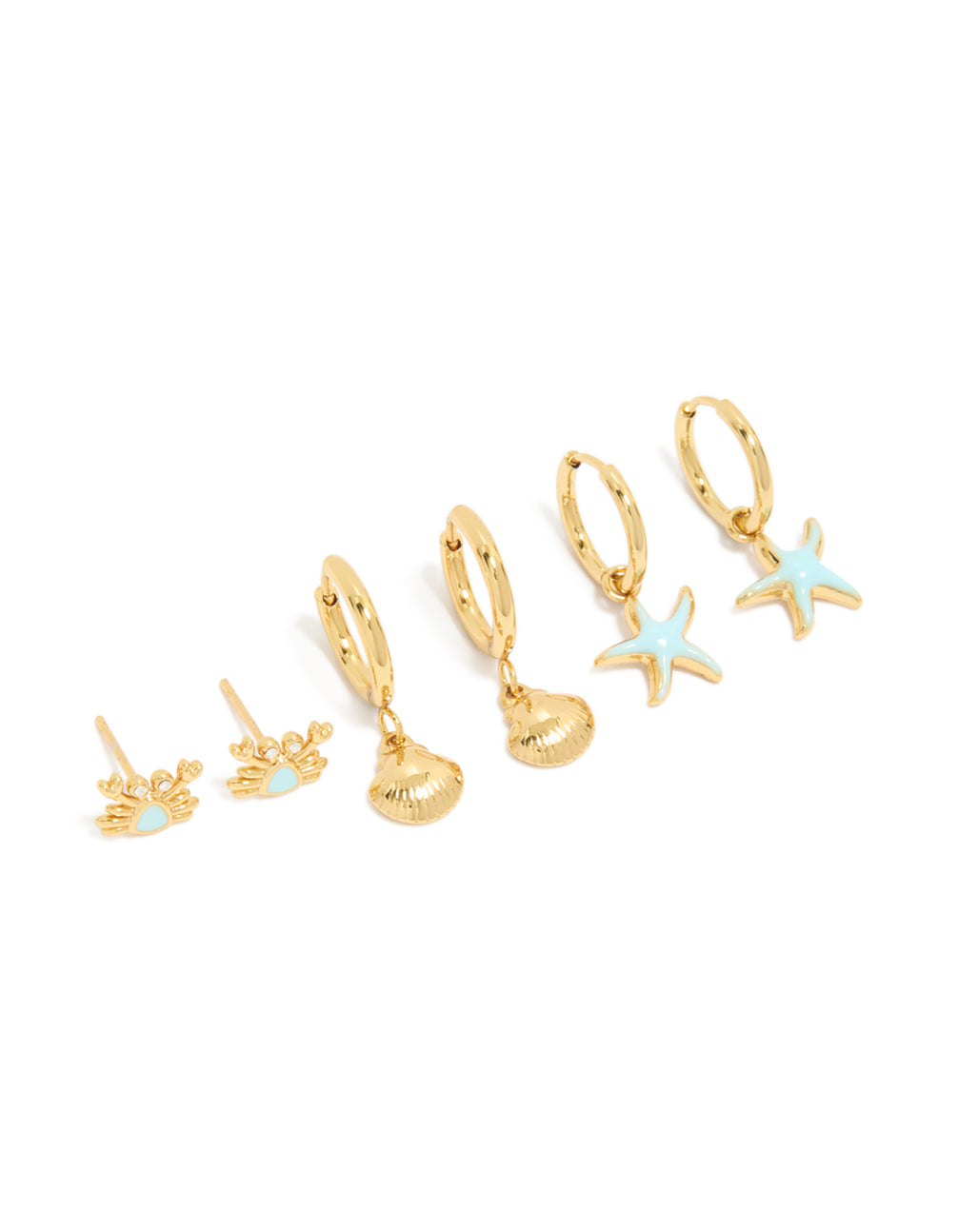 Showcasing waterproof gold plated stainless steel sea stacking earrings in a 3-pack featuring ocean charm with shell huggie closure and powder blue accents front view