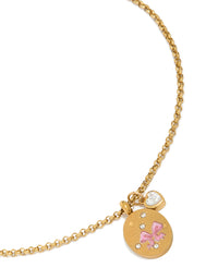 Elegantly crafted gold plated stainless steel necklace with pink bow enamel charm, heart pendant, cubic zirconia, and waterproof disc features front view - link has visual effect only