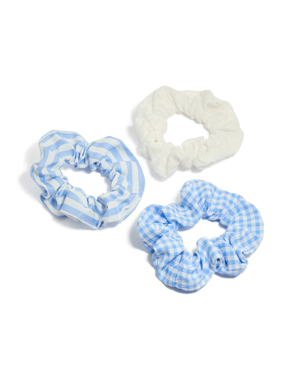 Showcasing a checkered and striped 3-pack of scrunchies in light blue, white, and cream front view