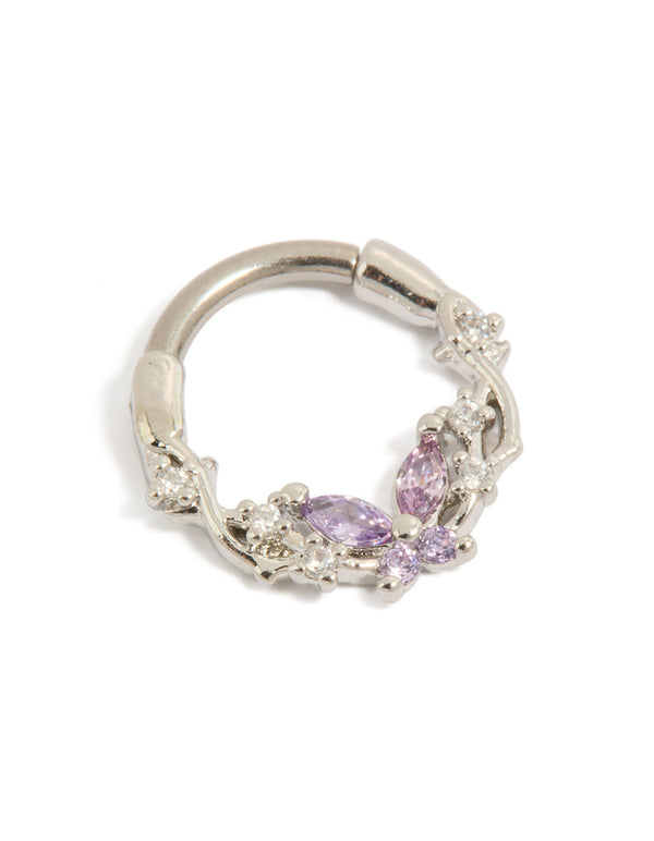 Showcasing a titanium clicker ring with butterfly design featuring lilac cubic zirconia stones in silver and plum tones detail view