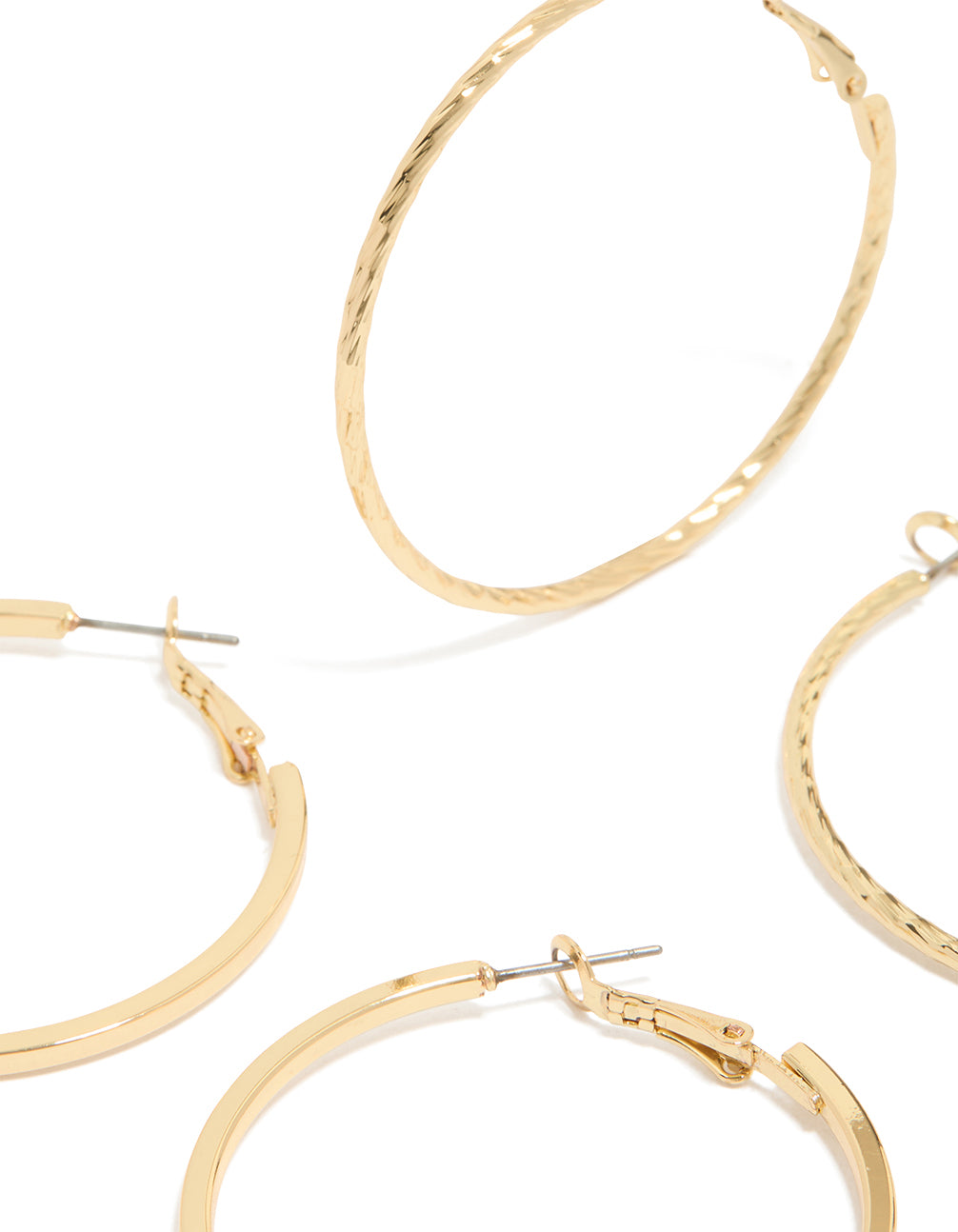 Designed with gold plated smooth and textured hoop earrings in a 2-pack close up view