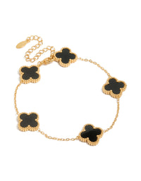 Showcasing a waterproof gold plated stainless steel black clover chain bracelet with charm details in a dainty style front view - link has visual effect only