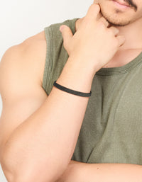 Crafted from waterproof black coated stainless steel, this mens woven wrist cuff bracelet is shown on wrist view - link has visual effect only