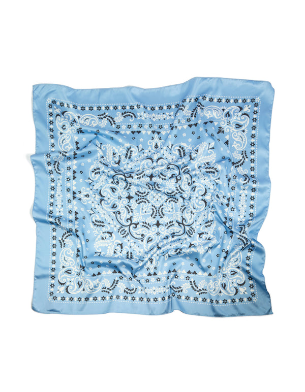 Crafted from fabric, this pale blue scarf with printed paisley pattern and leaf details in light sky blue, white, and black detail view