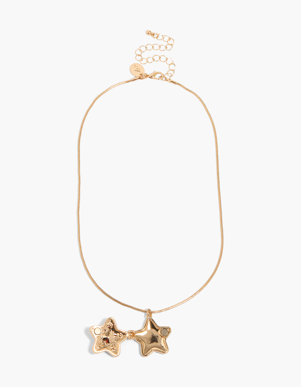 Explore a kids gold diamante star locket pendant necklace close up view