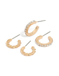 Showcasing a gold twisted and diamante open hoop earrings pack front view - link has visual effect only