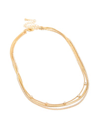 Experience the elegance of this gold plated cubic zirconia tennis snake chain triple layered necklace front view - link has visual effect only