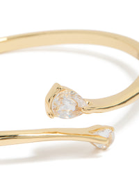 Showcasing gold plated cubic zirconia flat teardrop open front bangle with statement design close up view - link has visual effect only