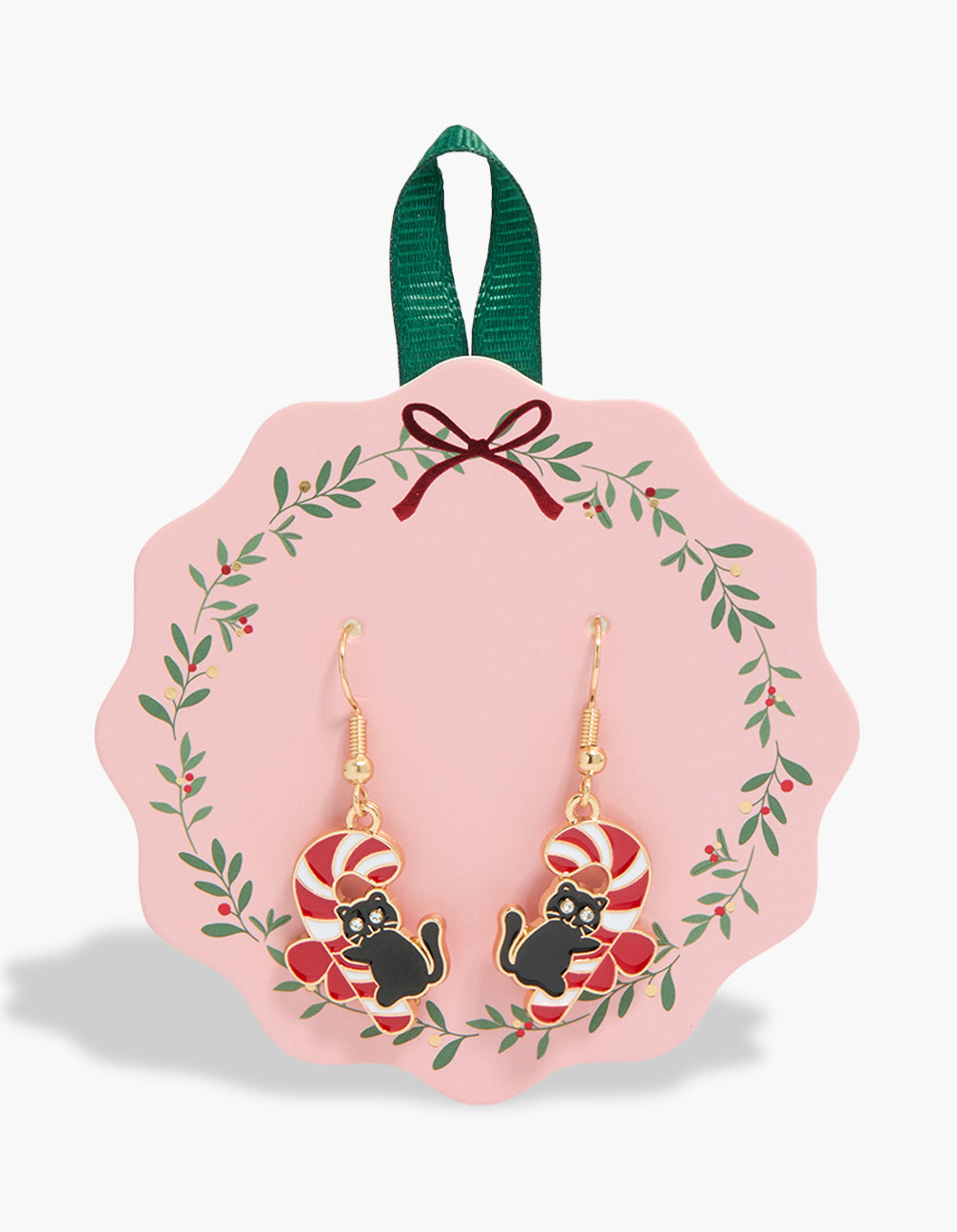 Festive gold candy cane cat drop earrings featuring bow and food details in red, white and black front view