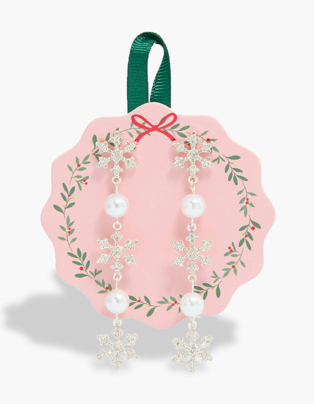 Showcasing silver pearl and snowflake earrings featuring clear accents front view