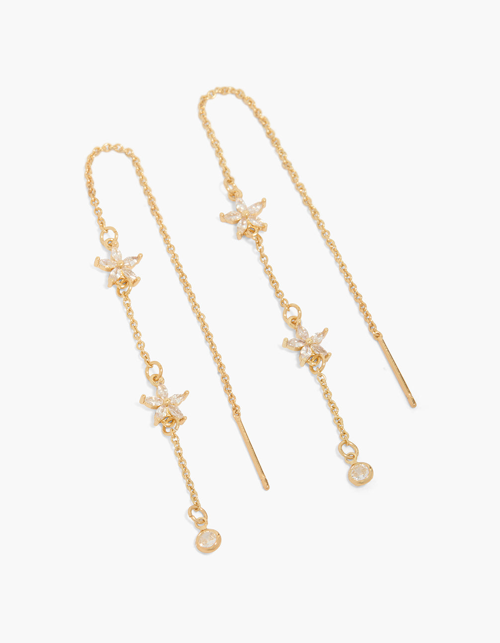 Featuring gold plated cubic zirconia flower threader earrings in clear stone front view