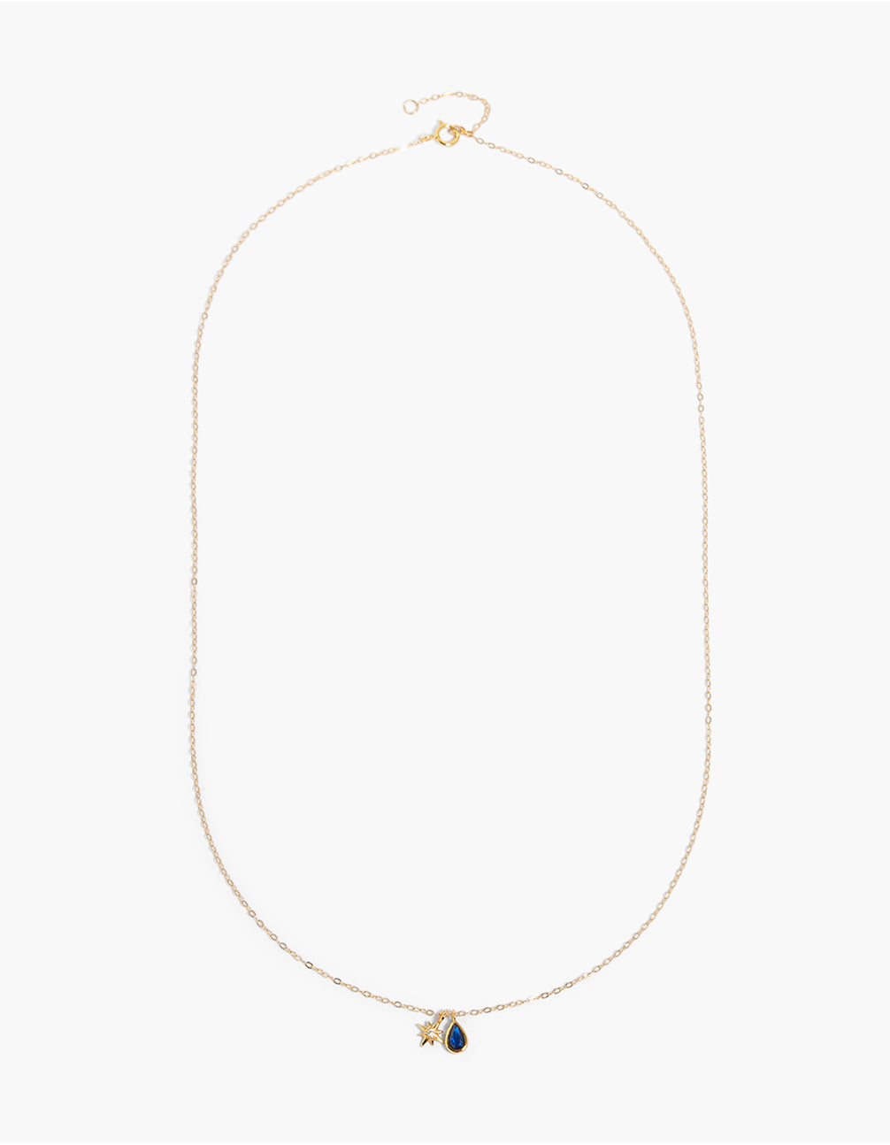 Showcasing celestial star charm gold plated sterling silver cubic zirconia necklace front view