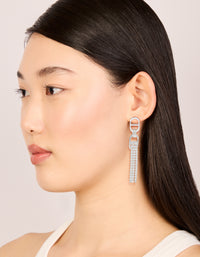 Styled silver diamante round attached tassel drop earrings on model view - link has visual effect only