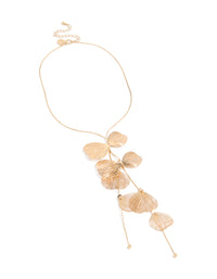 Crafted from gold with laser cut petals, this Y-necklace with statement style front view - link has visual effect only