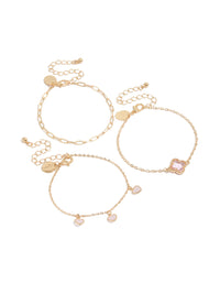 Showcasing gold pink diamante flower and heart chain bracelets in a 3-pack with charm details and enamel material front view - link has visual effect only