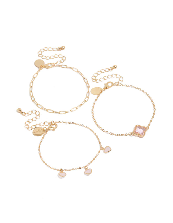 Showcasing gold pink diamante flower and heart chain bracelets in a 3-pack with charm details and enamel material front view