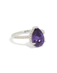 Showcasing a silver plated textured ring with pear cut cubic zirconia crystal in purple front view - link has visual effect only
