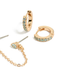 Elegant pack displaying floral huggie earrings featuring chain with light blue cubic zirconia stones in gold close up view - link has visual effect only