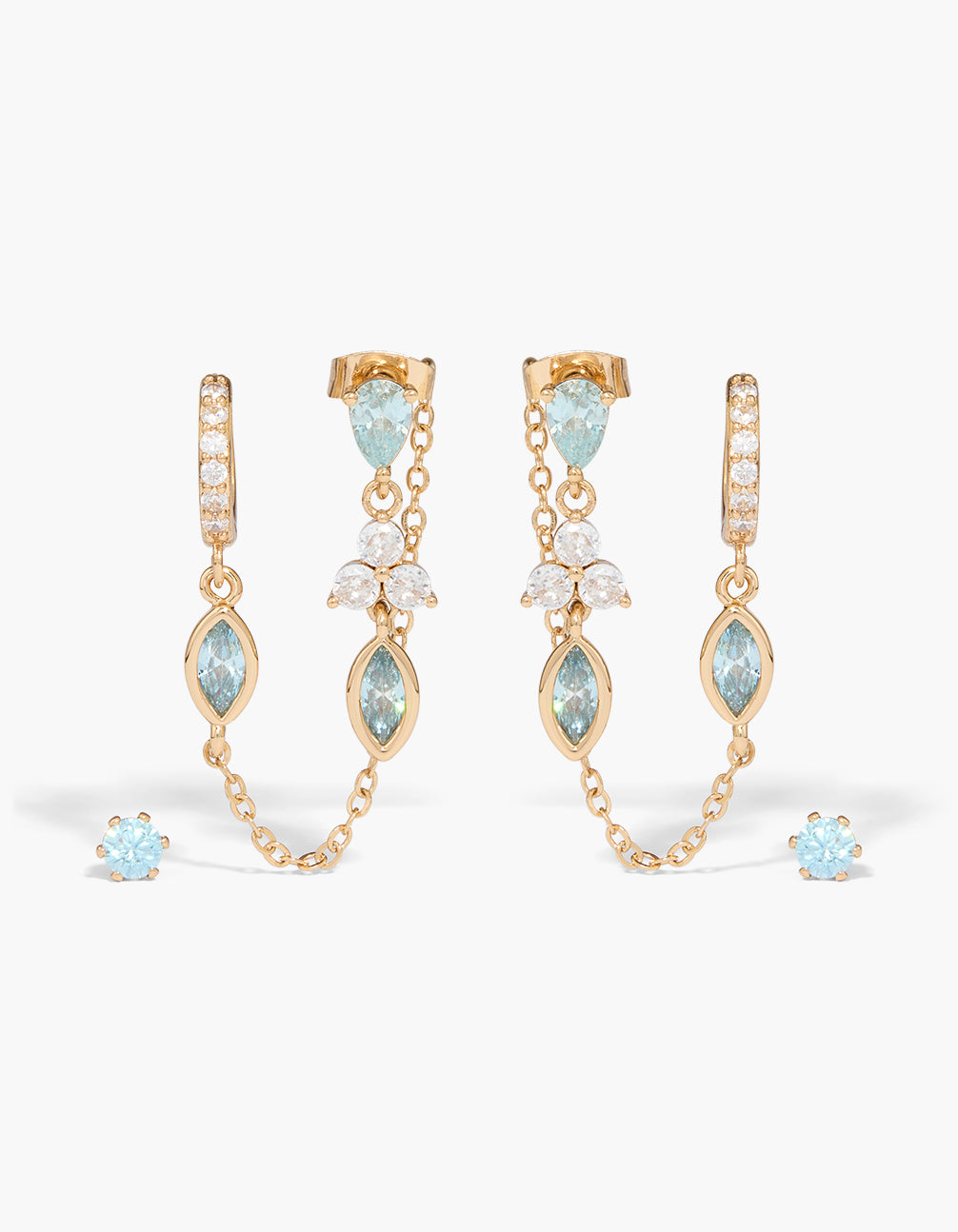Showcasing gold blue cubic zirconia stud and chain earrings with charm details in a stylish 3-pack front view