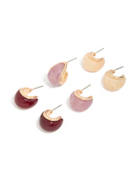 Featuring chunky statement hoop earrings in a 3-pack with gold, burgundy, and pink acrylic bubble design front view - link has visual effect only