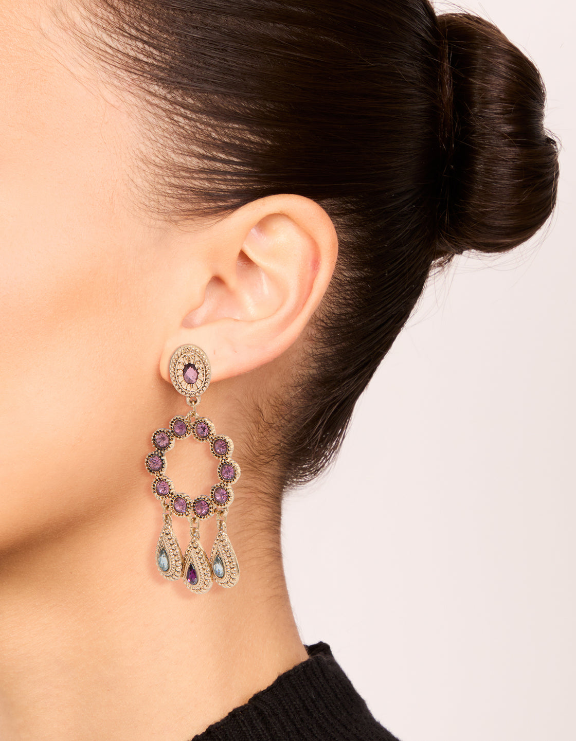 Elegant antique gold pink and clear diamante round drop earrings on ear view